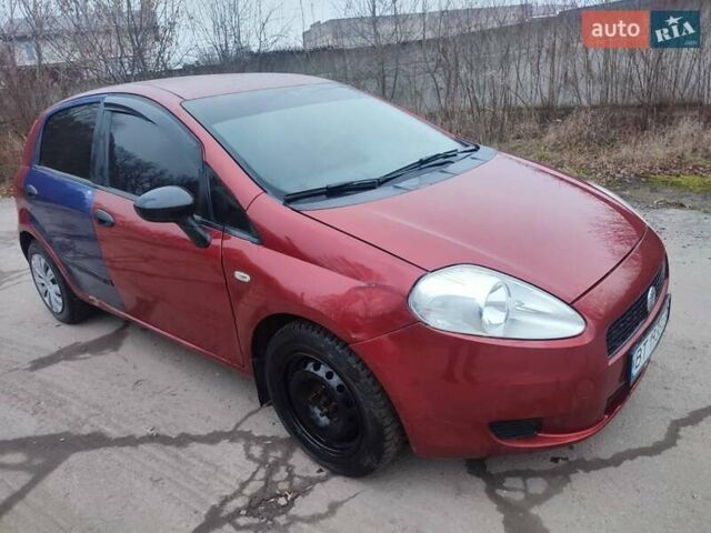 Червоний Фіат Гранде Пунто, об'ємом двигуна 1.24 л та пробігом 126 тис. км за 2200 $, фото 8 на Automoto.ua