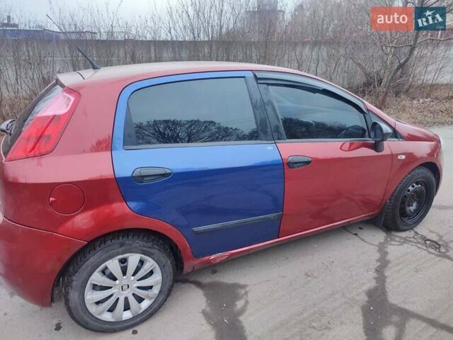 Червоний Фіат Гранде Пунто, об'ємом двигуна 1.24 л та пробігом 126 тис. км за 2200 $, фото 9 на Automoto.ua