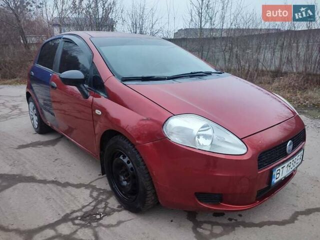 Червоний Фіат Гранде Пунто, об'ємом двигуна 1.24 л та пробігом 126 тис. км за 2200 $, фото 15 на Automoto.ua