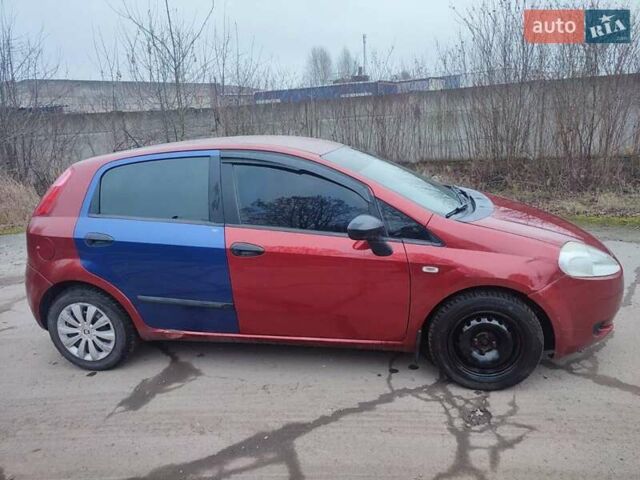 Червоний Фіат Гранде Пунто, об'ємом двигуна 1.24 л та пробігом 126 тис. км за 2200 $, фото 11 на Automoto.ua