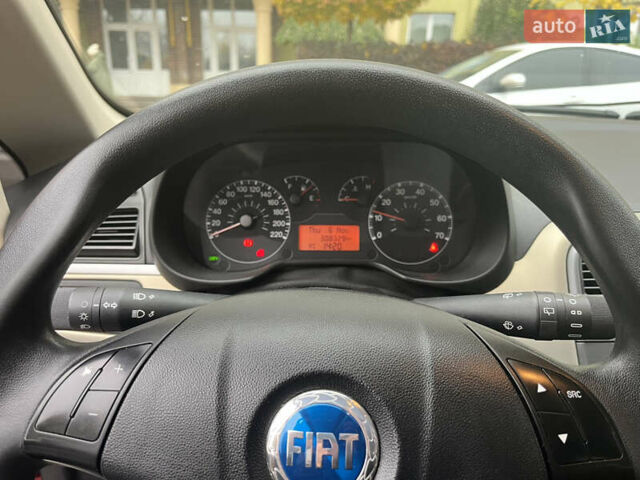 Червоний Фіат Гранде Пунто, об'ємом двигуна 1.37 л та пробігом 308 тис. км за 3900 $, фото 13 на Automoto.ua
