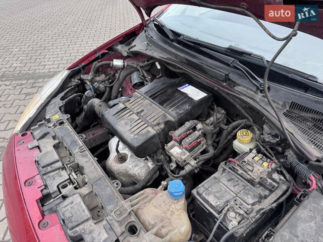 Красный Фиат Гранде Пунто, объемом двигателя 1.4 л и пробегом 236 тыс. км за 4700 $, фото 9 на Automoto.ua