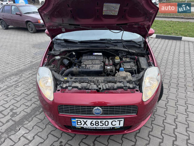 Красный Фиат Гранде Пунто, объемом двигателя 1.4 л и пробегом 236 тыс. км за 4700 $, фото 11 на Automoto.ua