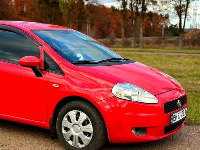 Красный Фиат Гранде Пунто, объемом двигателя 1.4 л и пробегом 208 тыс. км за 4700 $, фото 5 на Automoto.ua