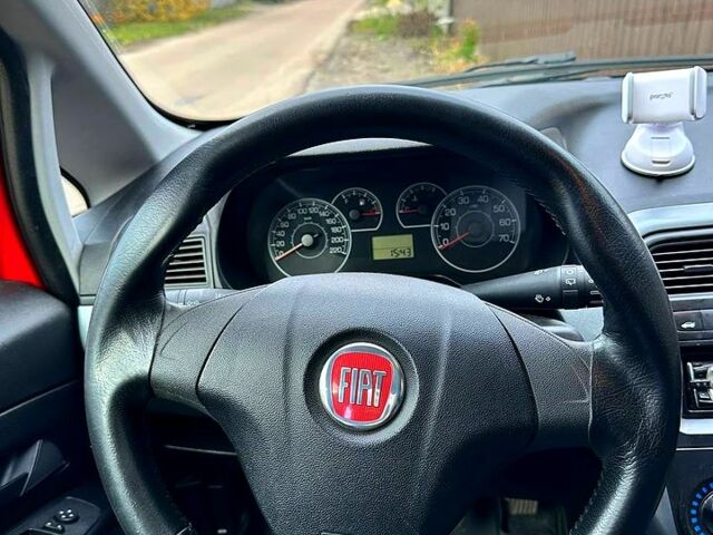 Красный Фиат Гранде Пунто, объемом двигателя 1.4 л и пробегом 208 тыс. км за 4700 $, фото 12 на Automoto.ua