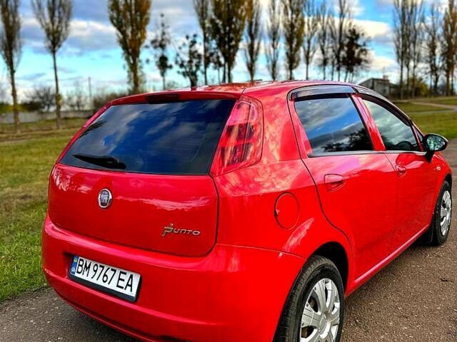 Красный Фиат Гранде Пунто, объемом двигателя 1.4 л и пробегом 208 тыс. км за 4700 $, фото 8 на Automoto.ua