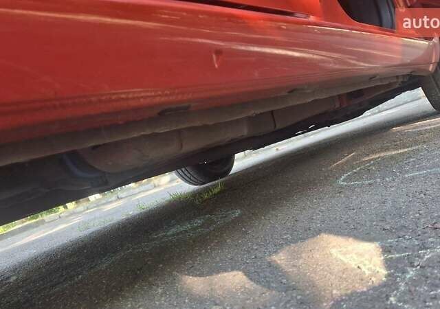 Красный Фиат Гранде Пунто, объемом двигателя 1.37 л и пробегом 147 тыс. км за 5600 $, фото 12 на Automoto.ua