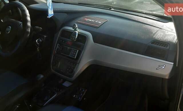 Сірий Фіат Гранде Пунто, об'ємом двигуна 1.37 л та пробігом 177 тис. км за 4500 $, фото 6 на Automoto.ua