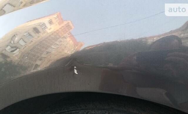 Серый Фиат Гранде Пунто, объемом двигателя 1.4 л и пробегом 167 тыс. км за 4500 $, фото 12 на Automoto.ua