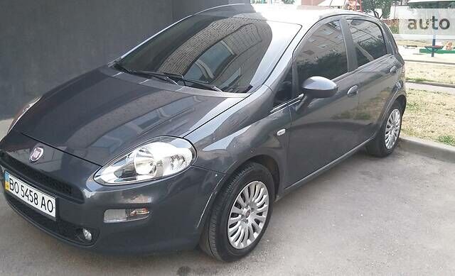 Серый Фиат Гранде Пунто, объемом двигателя 1.4 л и пробегом 167 тыс. км за 4500 $, фото 15 на Automoto.ua