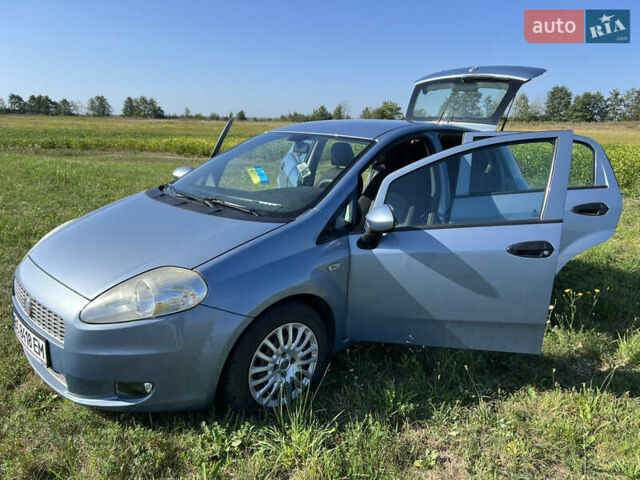 Синий Фиат Гранде Пунто, объемом двигателя 1.37 л и пробегом 72 тыс. км за 5900 $, фото 13 на Automoto.ua