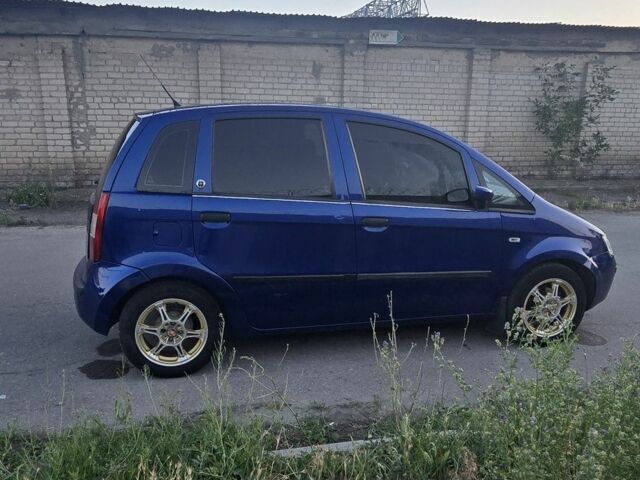 Синий Фиат Идея, объемом двигателя 1.4 л и пробегом 221 тыс. км за 4200 $, фото 5 на Automoto.ua