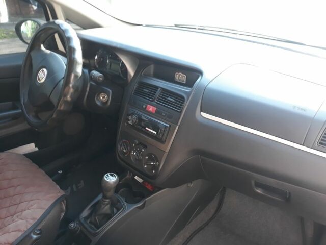 Белый Фиат Линеа, объемом двигателя 1.6 л и пробегом 267 тыс. км за 4500 $, фото 2 на Automoto.ua