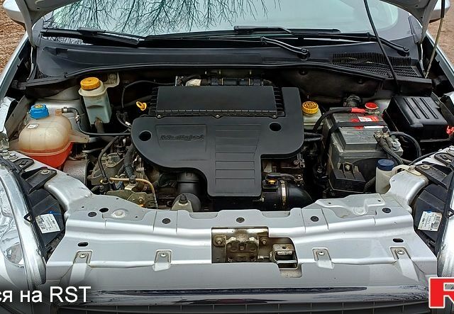 Серый Фиат Линеа, объемом двигателя 1.3 л и пробегом 53 тыс. км за 7700 $, фото 10 на Automoto.ua