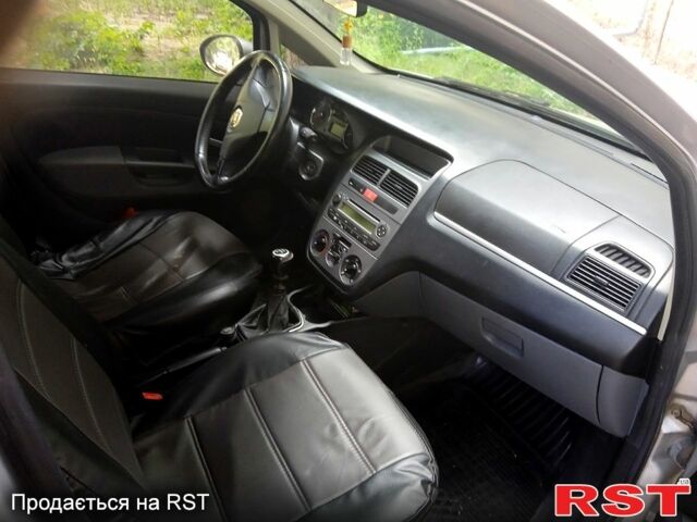 Серый Фиат Линеа, объемом двигателя 1.4 л и пробегом 201 тыс. км за 4200 $, фото 2 на Automoto.ua