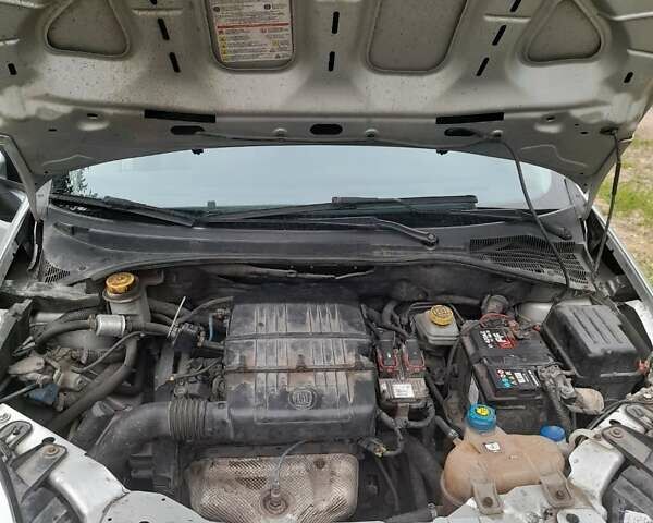 Серый Фиат Линеа, объемом двигателя 1.37 л и пробегом 180 тыс. км за 4900 $, фото 7 на Automoto.ua