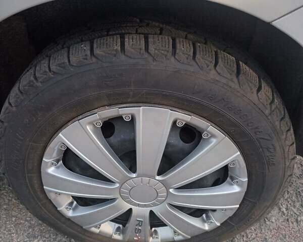 Серый Фиат Линеа, объемом двигателя 1.4 л и пробегом 241 тыс. км за 4800 $, фото 1 на Automoto.ua