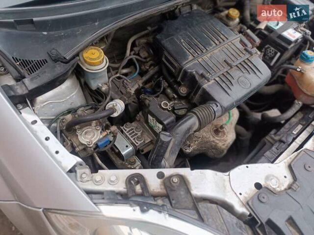 Серый Фиат Линеа, объемом двигателя 1.37 л и пробегом 180 тыс. км за 490 $, фото 32 на Automoto.ua