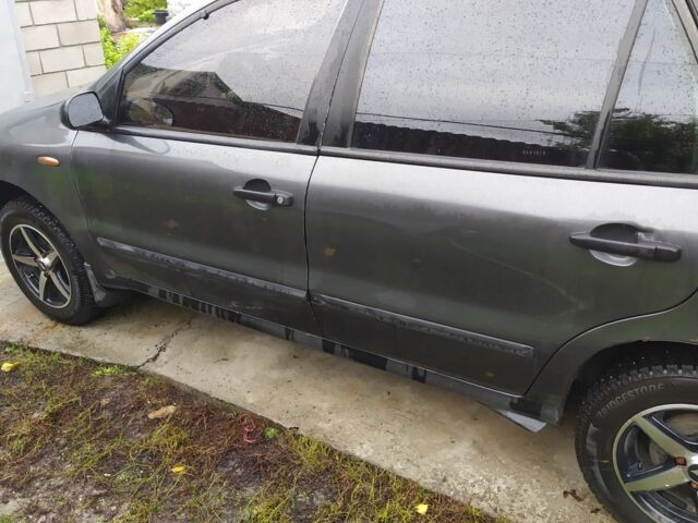 Серый Фиат Мареа, объемом двигателя 1.6 л и пробегом 370 тыс. км за 400 $, фото 1 на Automoto.ua