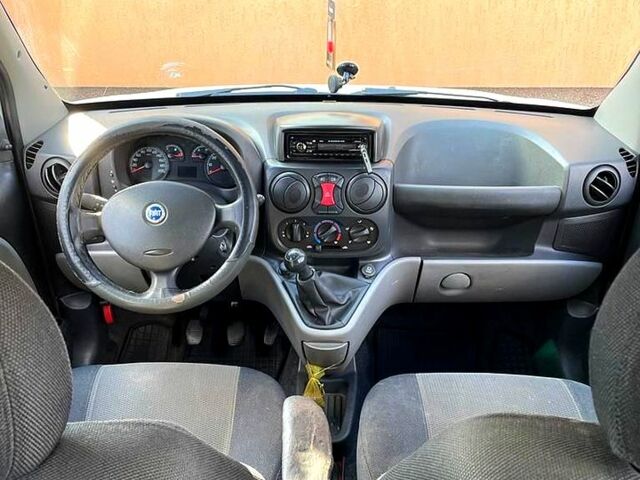 Белый Фиат Добло, объемом двигателя 1.3 л и пробегом 295 тыс. км за 4000 $, фото 6 на Automoto.ua