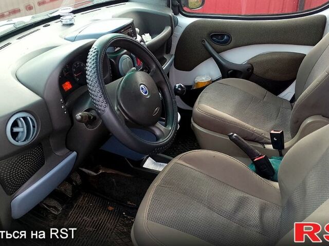 Белый Фиат Добло, объемом двигателя 1.9 л и пробегом 280 тыс. км за 3700 $, фото 3 на Automoto.ua