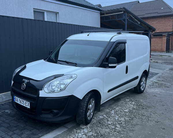 Белый Фиат Добло, объемом двигателя 1.25 л и пробегом 210 тыс. км за 5000 $, фото 15 на Automoto.ua