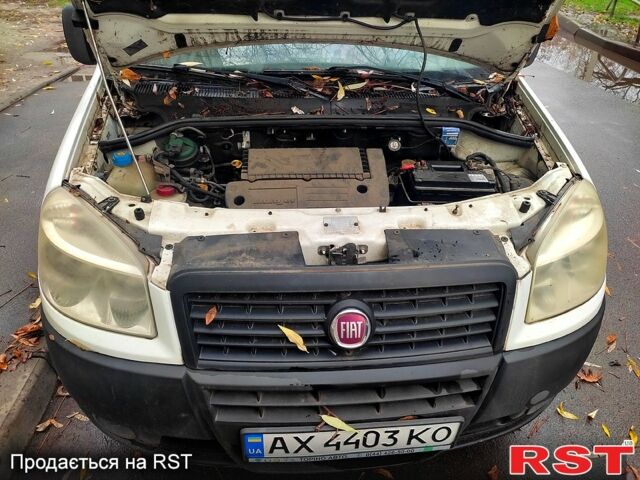 Белый Фиат Добло, объемом двигателя 1.2 л и пробегом 215 тыс. км за 2800 $, фото 10 на Automoto.ua