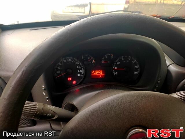 Белый Фиат Добло, объемом двигателя 1.2 л и пробегом 215 тыс. км за 2800 $, фото 3 на Automoto.ua