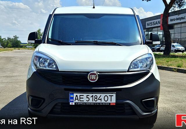 Белый Фиат Добло, объемом двигателя 1.3 л и пробегом 98 тыс. км за 10100 $, фото 1 на Automoto.ua