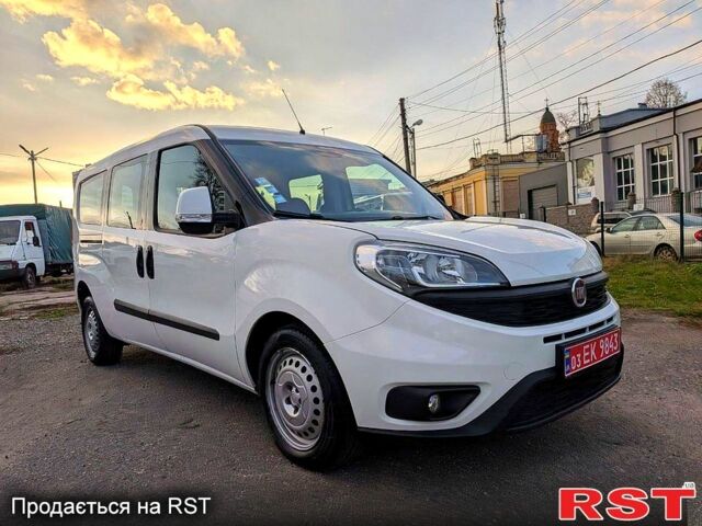 Белый Фиат Добло, объемом двигателя 1.3 л и пробегом 100 тыс. км за 10800 $, фото 1 на Automoto.ua