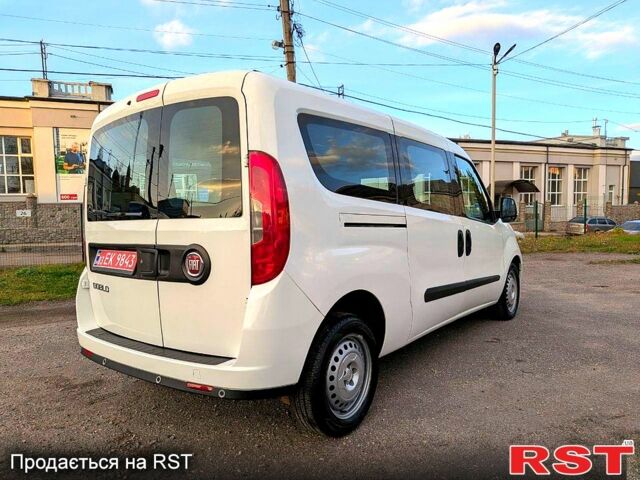 Белый Фиат Добло, объемом двигателя 1.3 л и пробегом 100 тыс. км за 10800 $, фото 2 на Automoto.ua