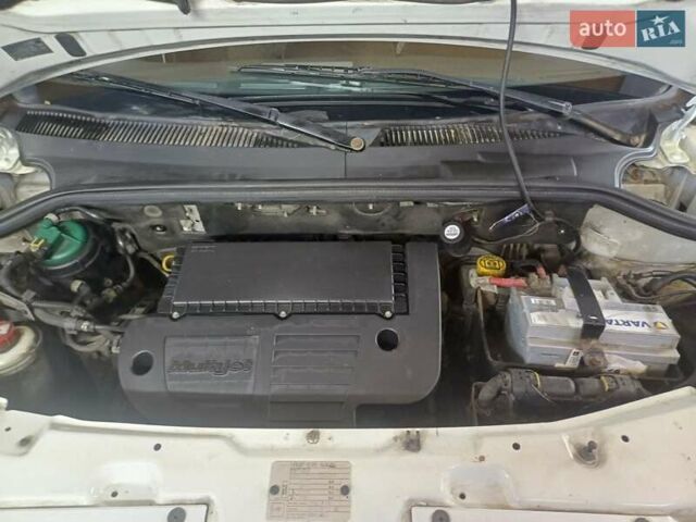 Белый Фиат Добло, объемом двигателя 1.25 л и пробегом 133 тыс. км за 5500 $, фото 6 на Automoto.ua