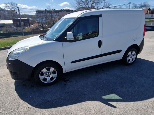 Белый Фиат Добло, объемом двигателя 1.2 л и пробегом 234 тыс. км за 4500 $, фото 1 на Automoto.ua