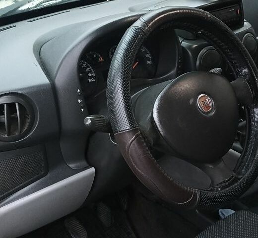 Белый Фиат Добло, объемом двигателя 1.4 л и пробегом 364 тыс. км за 3800 $, фото 12 на Automoto.ua