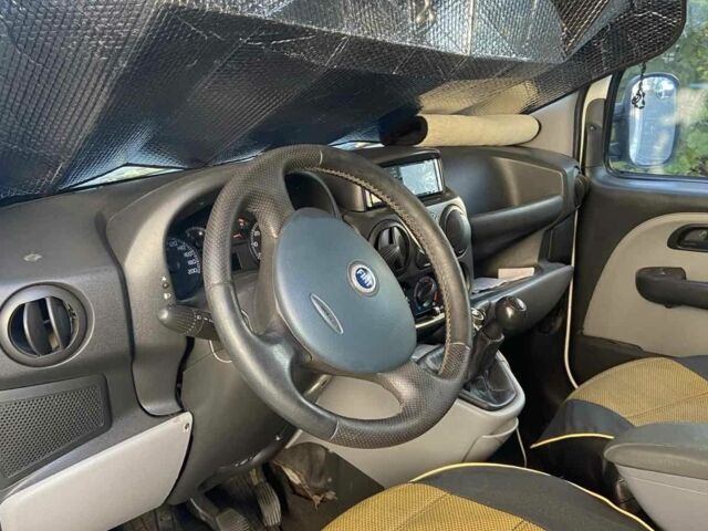 Белый Фиат Добло, объемом двигателя 1.9 л и пробегом 230 тыс. км за 4300 $, фото 3 на Automoto.ua