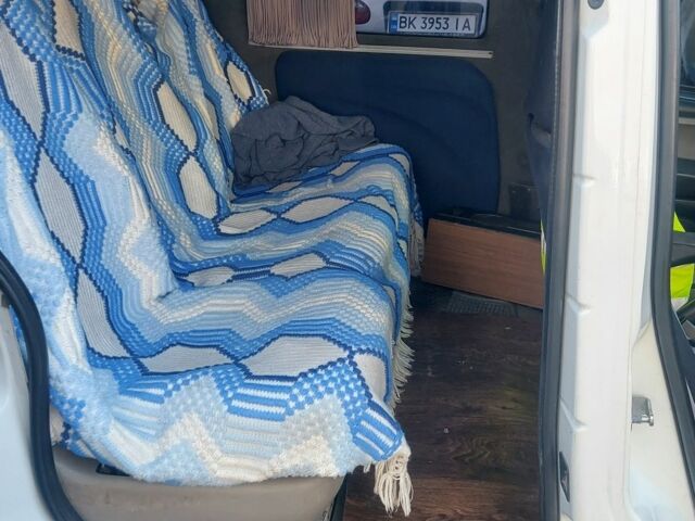 Белый Фиат Добло, объемом двигателя 1.2 л и пробегом 320 тыс. км за 3750 $, фото 1 на Automoto.ua