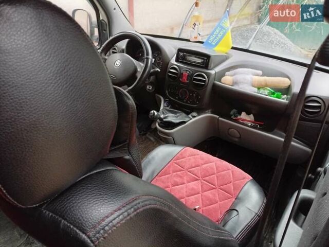 Белый Фиат Добло, объемом двигателя 1.37 л и пробегом 298 тыс. км за 2999 $, фото 3 на Automoto.ua