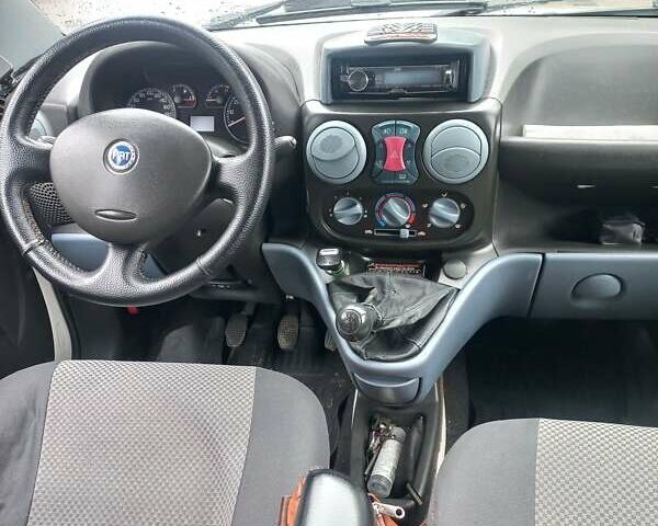 Белый Фиат Добло, объемом двигателя 1.91 л и пробегом 330 тыс. км за 4000 $, фото 4 на Automoto.ua