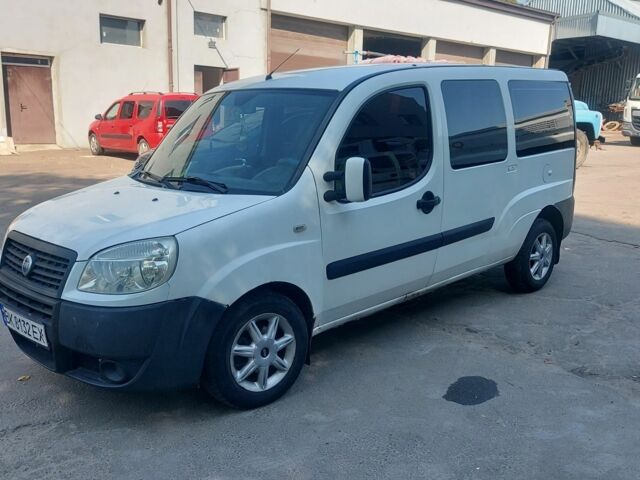 Белый Фиат Добло, объемом двигателя 1.2 л и пробегом 320 тыс. км за 3750 $, фото 4 на Automoto.ua
