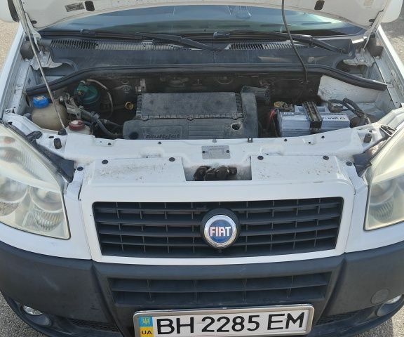 Белый Фиат Добло, объемом двигателя 1.2 л и пробегом 265 тыс. км за 4500 $, фото 7 на Automoto.ua