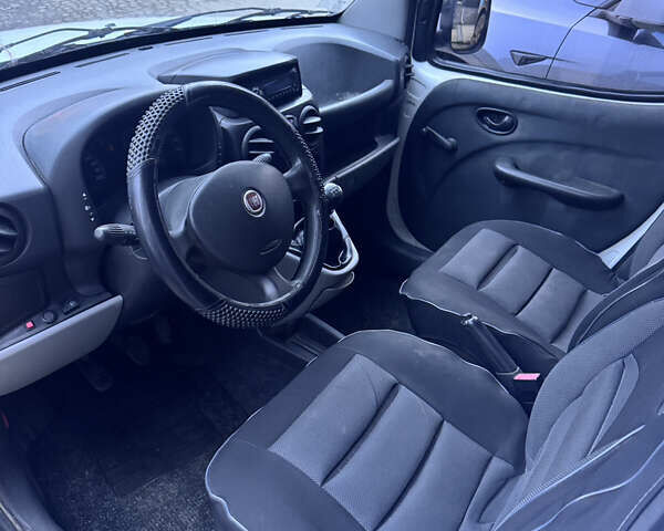 Белый Фиат Добло, объемом двигателя 1.4 л и пробегом 270 тыс. км за 2900 $, фото 5 на Automoto.ua