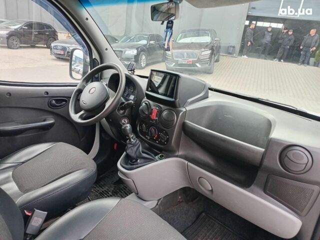 Белый Фиат Добло, объемом двигателя 1.4 л и пробегом 270 тыс. км за 4790 $, фото 23 на Automoto.ua