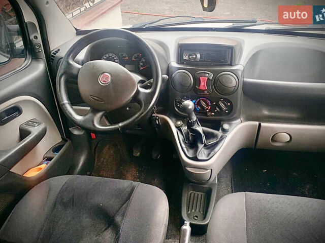 Белый Фиат Добло, объемом двигателя 1.25 л и пробегом 325 тыс. км за 5500 $, фото 7 на Automoto.ua
