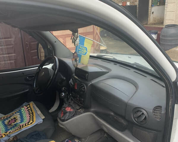 Белый Фиат Добло, объемом двигателя 1.9 л и пробегом 295 тыс. км за 5300 $, фото 1 на Automoto.ua