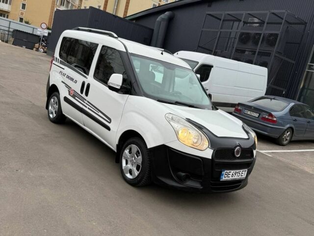 Белый Фиат Добло, объемом двигателя 1.2 л и пробегом 220 тыс. км за 5999 $, фото 1 на Automoto.ua