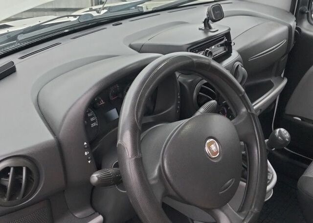 Белый Фиат Добло, объемом двигателя 1.4 л и пробегом 140 тыс. км за 5900 $, фото 22 на Automoto.ua