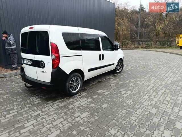 Белый Фиат Добло, объемом двигателя 1.25 л и пробегом 263 тыс. км за 3650 $, фото 1 на Automoto.ua