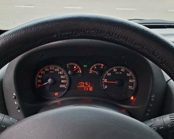 Белый Фиат Добло, объемом двигателя 1.25 л и пробегом 174 тыс. км за 6750 $, фото 7 на Automoto.ua
