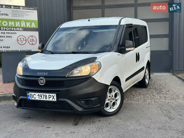 Белый Фиат Добло, объемом двигателя 1.3 л и пробегом 244 тыс. км за 8250 $, фото 1 на Automoto.ua