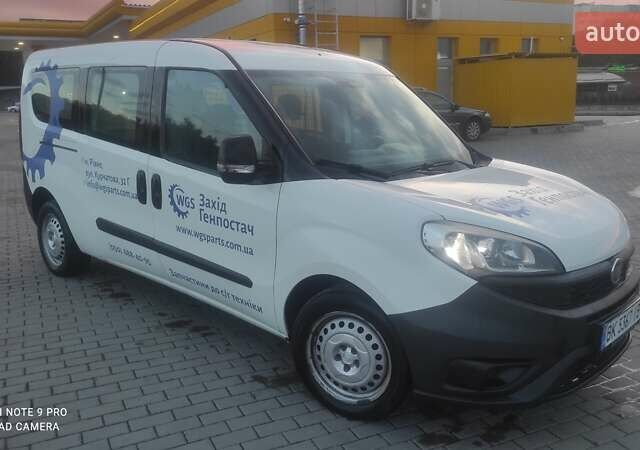 Белый Фиат Добло, объемом двигателя 1.25 л и пробегом 165 тыс. км за 8458 $, фото 5 на Automoto.ua